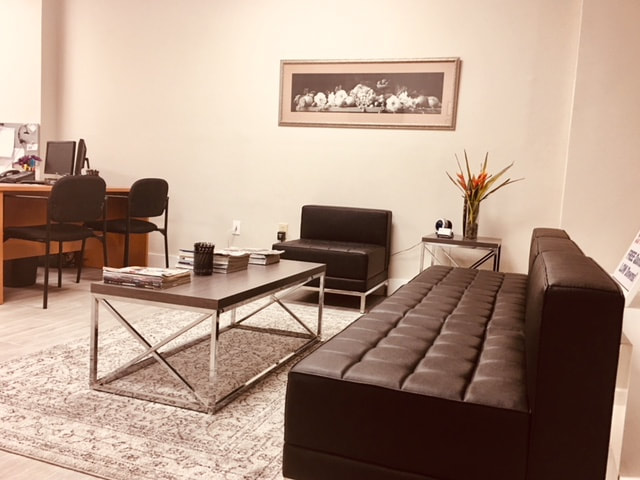 Office lounge with a sofa and table
